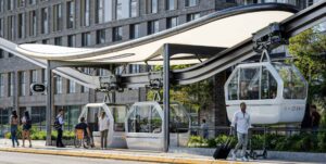 Rendering of passenger pickup and drop off at Whoosh cable car station