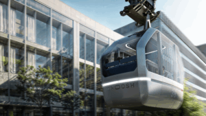 Rendering of Whoosh cable car passing building.